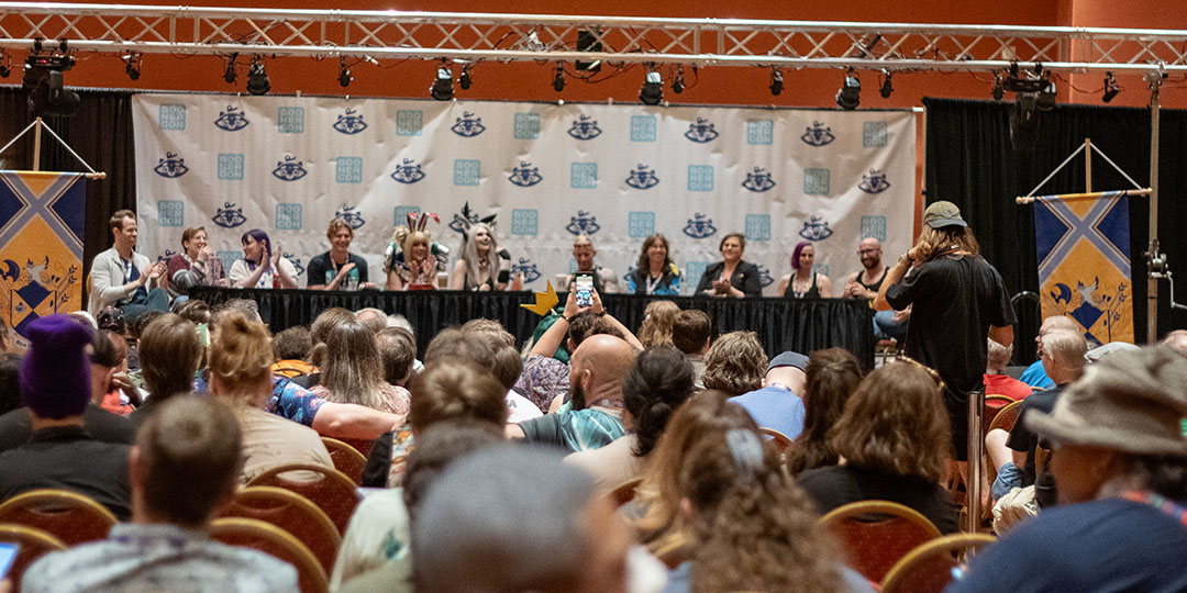 Picture from a crowd of panelists at a table