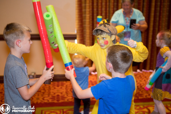 Kids playing with foam lightsabers